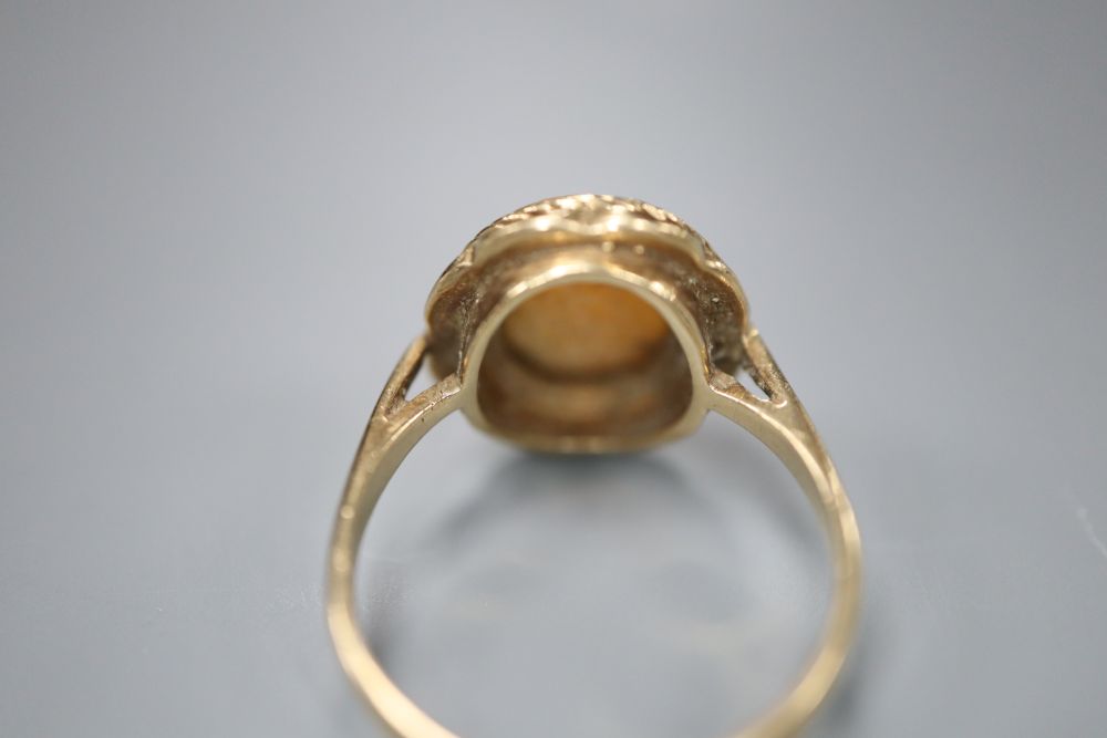 9ct gold and oval cameo shell set ring, carved with the bust of a lady to dexter, size K, gross 2.8 grams.